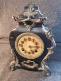 Early New Haven clock, steel case, no key