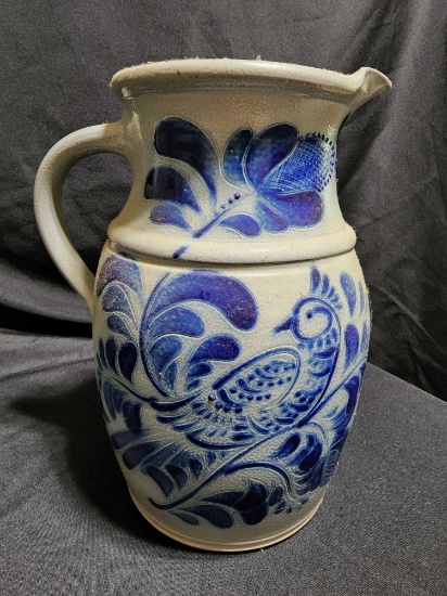 Signed and dated blue decorated pitcher