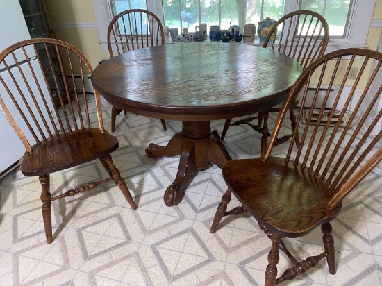 Modern claw footed 48" dia. round oak table w/ (4) chairs