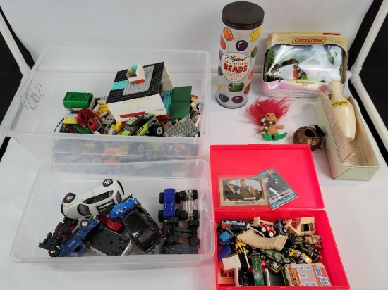 Legos, toy cars, vintage toys