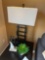 table lamps, faux plant, and household decor