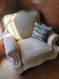 Lilly upholstered chair with nail head trim and accent pillow