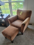 Upholstered bedroom chair with ottoman