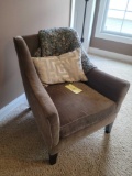 Accent bedroom chair with afghan and pillow