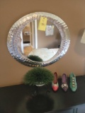 Metal framed oval mirror, artificial plant, composite decorative shoes