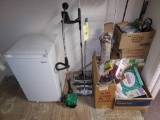 Bathroom Contents: Midea Mini Fridge, Weedwacker, Cleaning Supplies, Hardware, Work Fit Treadmill