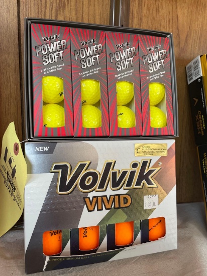two boxes Volvik golf balls