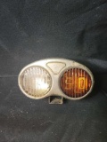 Vintage Slo automobile taillight lamp with glass lens