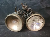 Pair of vintage automobile headlights