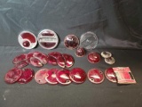 Box of assorted red glass automobile lenses, holders, one clear lens