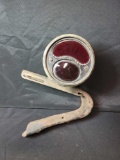 Vintage Studebaker Type A Stop automobile taillight lamp with glass lens and bracket