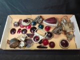 Box of miscellaneous vintage glass automobile lenses, holders and light housings