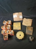 Box of Tung sol lamp bulbs, jeweled knob, radiator cap and United steel clip