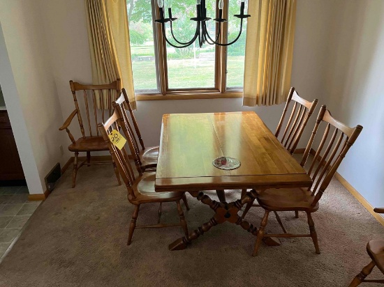 wooden table with 6 chairs