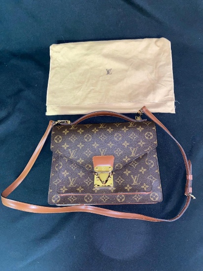 Louis Vuitton purse w/ strap & cloth protector.