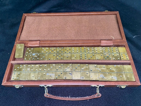 Carry case with solid brass dominoes.