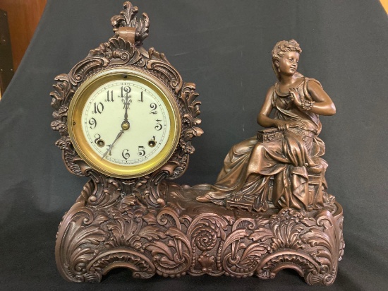New Haven porcelain face bronze statue clock, 17.5" long x 15" tall.