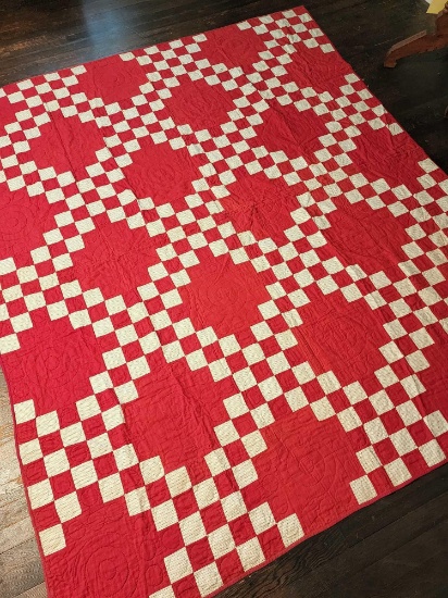 Early antique red and white calico star bullseye quilt