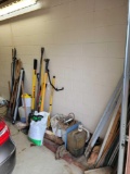 Group of newer yard tools, spud bars, iron, tamper, ropes