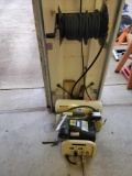 Ingersoll Rand jobsite air compressor with hose and reel. buyer responsible for removal