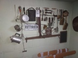 Wall of Vintage Tools, Signs, & Guitar