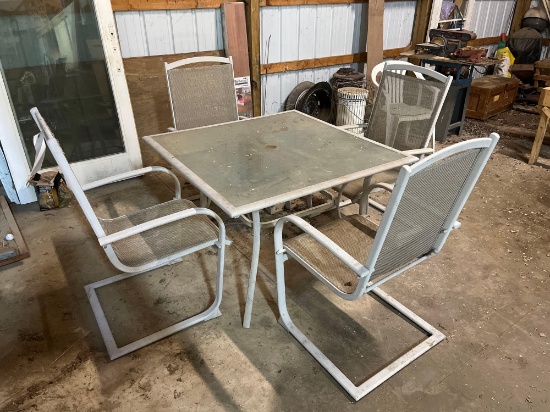 glass top patio table w/ 4 chairs