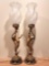 Pair of spelter cherub / putti lamps w/ glass shades