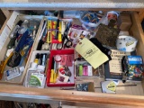 Tools & hardware in kitchen drawer.