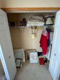 contents in closet - frames - VHS movies - linens - etc