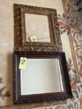 carved wood framed mirror and gold picture frame