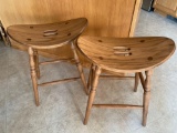 Pair of oak saddle type bar stools, 24