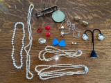 Costume jewelry, earrings, necklaces.