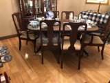 Nice Cherry Brewster Stroud Table with six chairs and one leaf