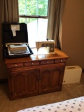 Singer console sewing machine and typewriter