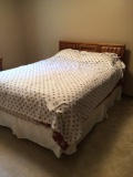 Full size bed with oak headboard