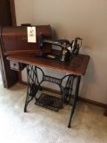 Clean Singer Treadle sewing machine.