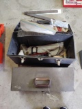 two toolboxes with assorted tools and files