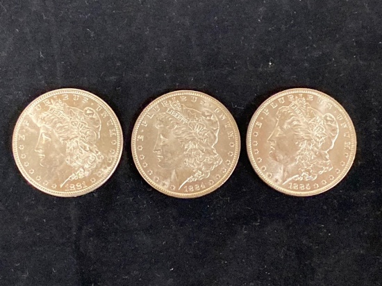 (3) Morgan silver dollars (1881-S, 1884-O, 1885-O). Bid times three.