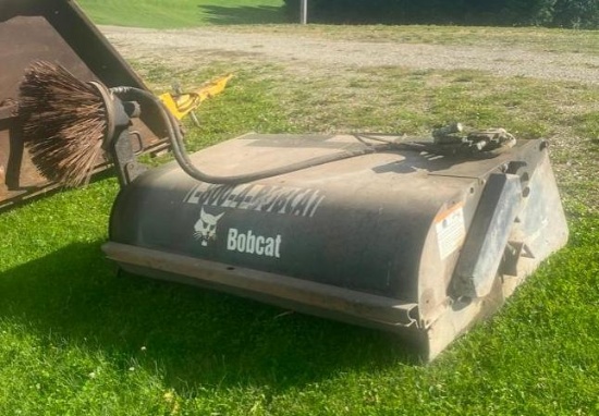 Bobcat Sweeper 72 attachment w/rotary curb brush.