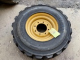 new cat spare time and tire to fit 262d skid steer