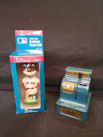 Cleveland Indians bobble head and Uncle Sam coin bank