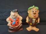 Plastic 1960 Hanna Barbera Barney figure and 1973 Fred Flinstone bank missing stopper