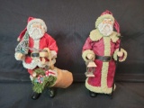 Pair of Santa Claus figures