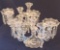 Vintage elegant glass candlesticks with flower vases and crystals