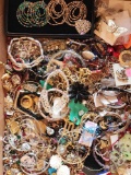 Large box of costume jewelry: bracelets, beads, pins