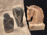(3) stone carvings: Inuit ? and horse head