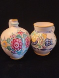 (2) hand painted pottery pitchers