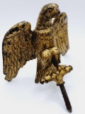 Very old American eagle, flag pole or fence topper