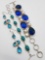 (2) silver bracelets and dangle earrings