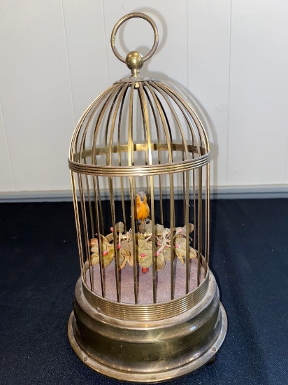 German windup musical bird in cage, 13" tall.